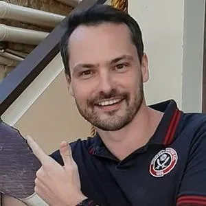 portrait of Dominic Field - Portrait with a smiling expression.